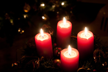 Christmas advent wreath with burning candles