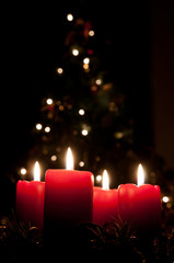 Christmas advent wreath with burning candles