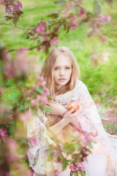 Beautiful woman and flowering tree