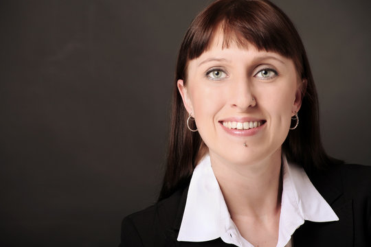 Portrait of businesswomen wearing a black suit and white blouse