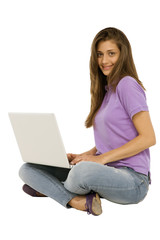 teenage girl using laptop