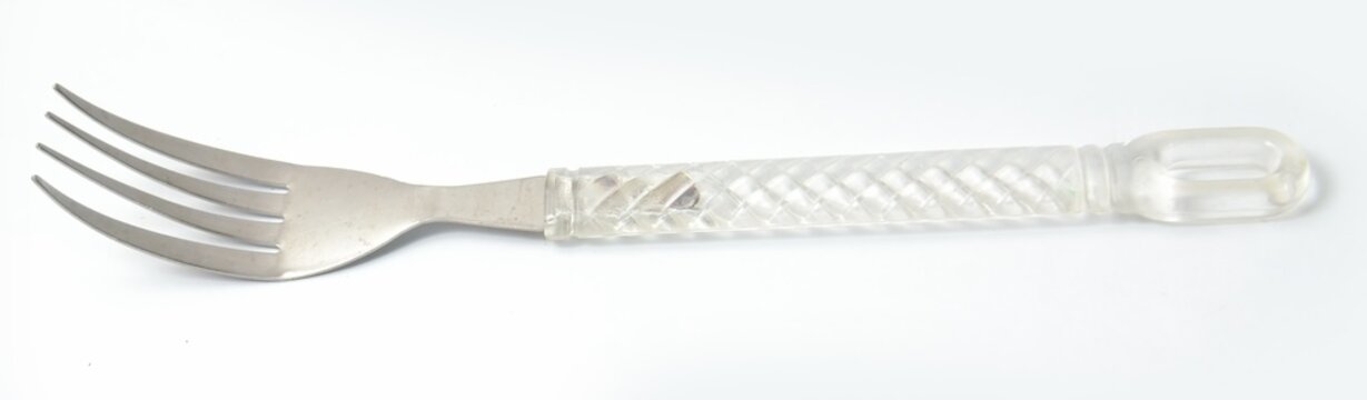 Silver fork with plastic transparent  handle