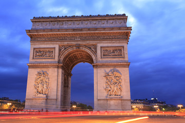 Fototapeta na wymiar Arc de Triomphe at dusk, Paris, France
