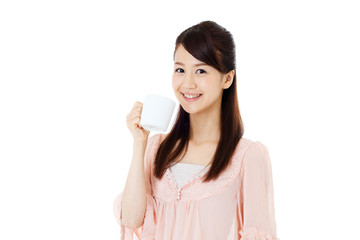 Beautiful young woman drinking coffee. Portrait of asian.