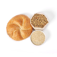 Round sandwich bun with sesame seeds isolated