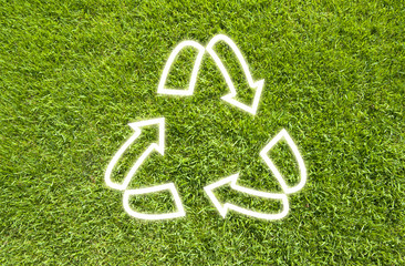 Recycle on Green grass,  texture background