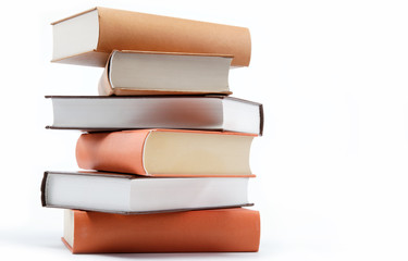 A stack of books on a white background.