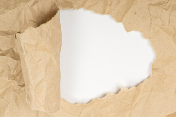 ripped white paper against a white background