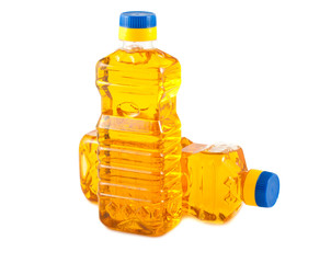 Two plastic bottles with vegetable oil