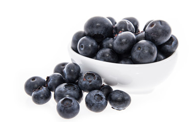 Blueberries in a bowl isolated on white