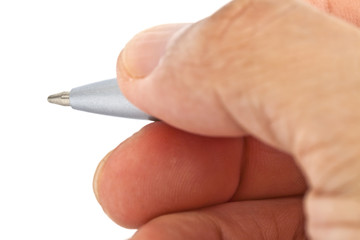 Hand holding a pen.