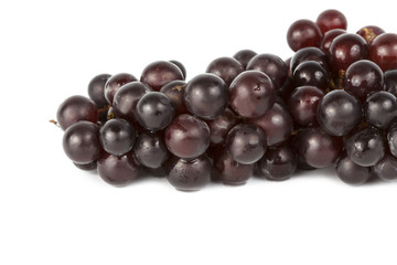 Wet grapes isolated on white