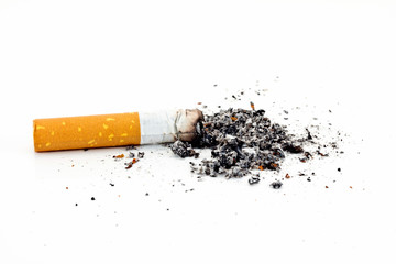 Single cigarette butt with ash isolated on white background