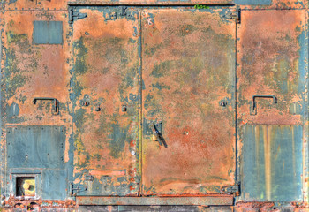 Rusty doors in metal container