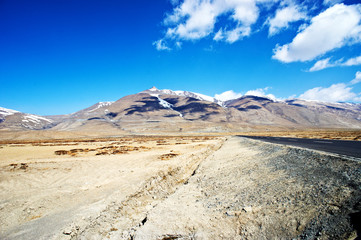 yellowish mountain road view in tibet