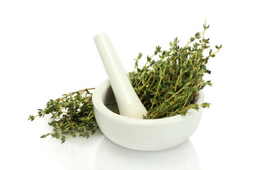 mortar with fresh green thyme isolated on white