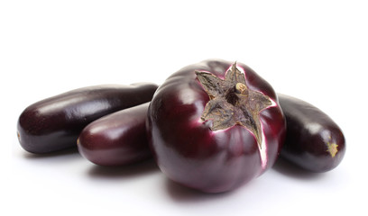 Fresh eggplants isolated on white.