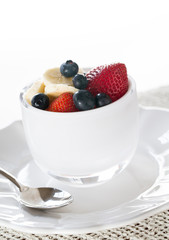 Breakfast of blueberries strawberries banana