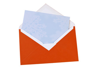 Leere hellblaue Weihnachtskarte im roten ge&ouml;ffneten Umschlag