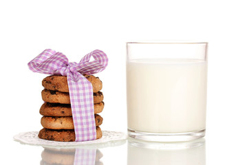 Glass of milk and cookies isolated on white