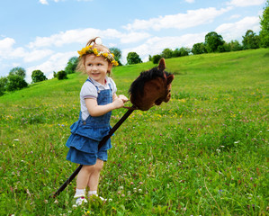 happy girl with horse stick