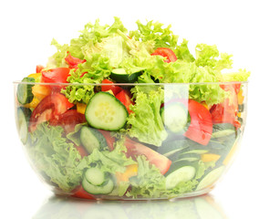 fresh vegetable salad in transparent bowl isolated on white