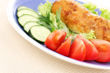 Tasty meat cutlet with garnish on plate