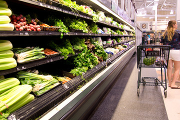 Shopping in store in vegetable department