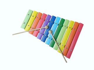 a colorful, wooden xylophone with mallet over white