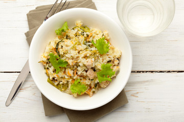 Rice with pork, carrots and spinach