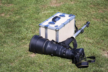 Camera, telephoto lens and carrying case.