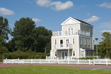 Fototapeta premium big wooden house with blue sky