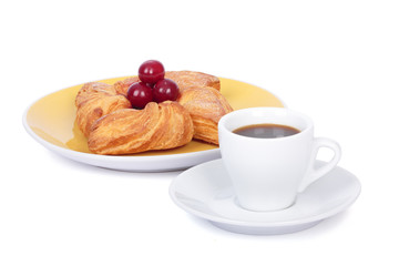 Cup of coffee with Puff pastry. Isolated on white.