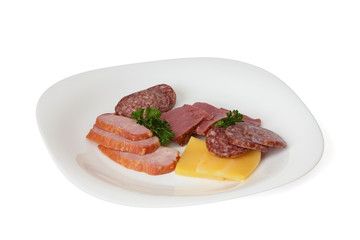 Cold meat, sausage and cheese on the plate