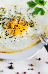 Fried eggs with spice
