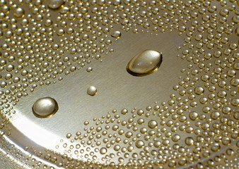 Water drops on a metal surface