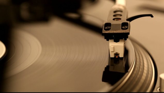 Spinning record on turntable, video