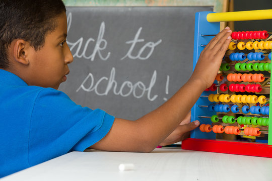 Child Using Abacus