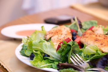 Grilled chicken with lettuce and fruit