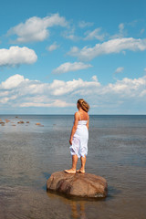 Woman on stone.