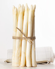 white asparagus on wooden table