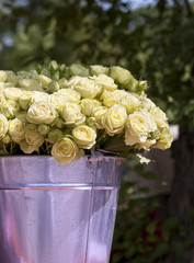 Beautiful bouquet of roses in bucket