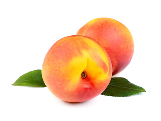 Fresh Peach Fruits with Green Leaves Isolated on White