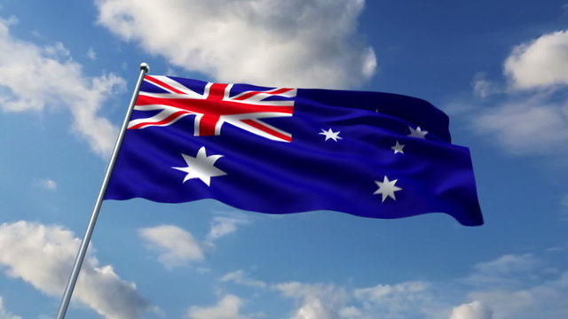 Australian flag waving against clouds background
