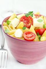 Pasta salad with mozzarella and cherry tomatoes