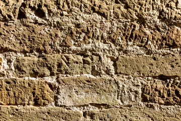 Schäden an Sandsteinwand