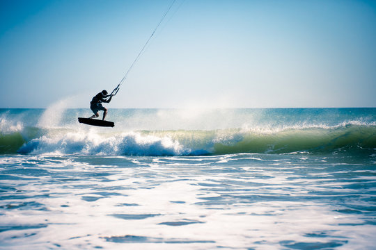 Kite surfing in waves.