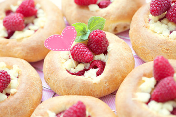 buns with raspberries