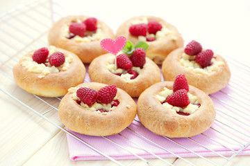 buns with raspberries