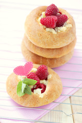 buns with raspberries